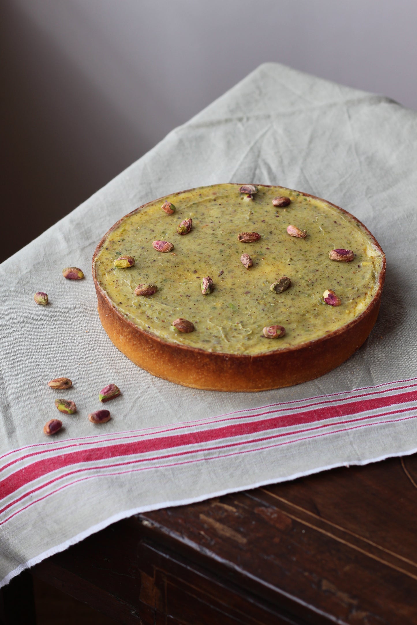 Cheesecake tart con pistacho